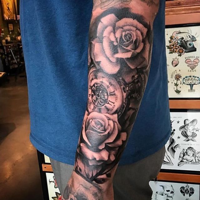 Black and grey realistic rose tattoo by Angel Mihov Palitra Tattoo, SF, BG  | Hand tattoos for guys, Rose hand tattoo, Rose tattoos for men