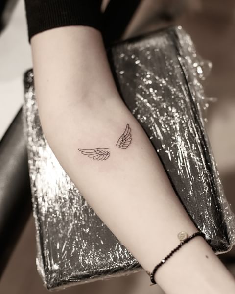 Ronik Meerwal | Forearms wings tattoo artwork 🪽 . . . #wingstattoo #tattoo  #wings #ink #tattoos #inked #tattooartist #tattooideas #tattooart  #nametat... | Instagram