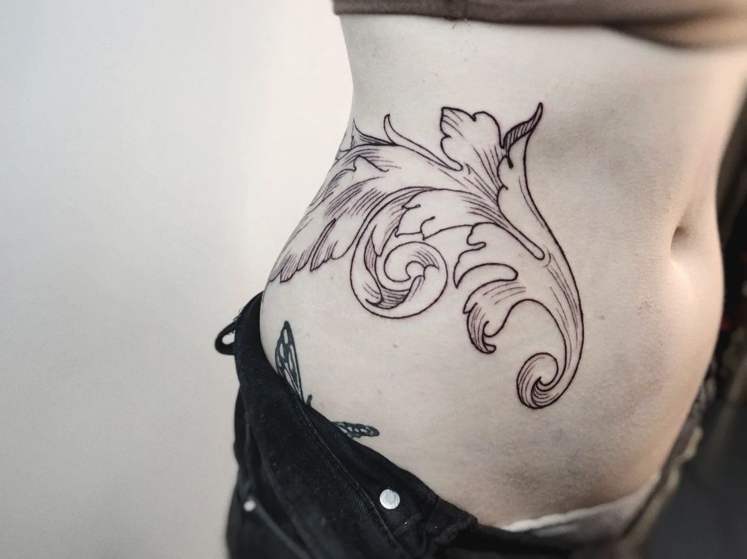 A Woman Has A Tattoo Of A Footprint On Her Hip. Stock Photo, Picture and  Royalty Free Image. Image 23730493.